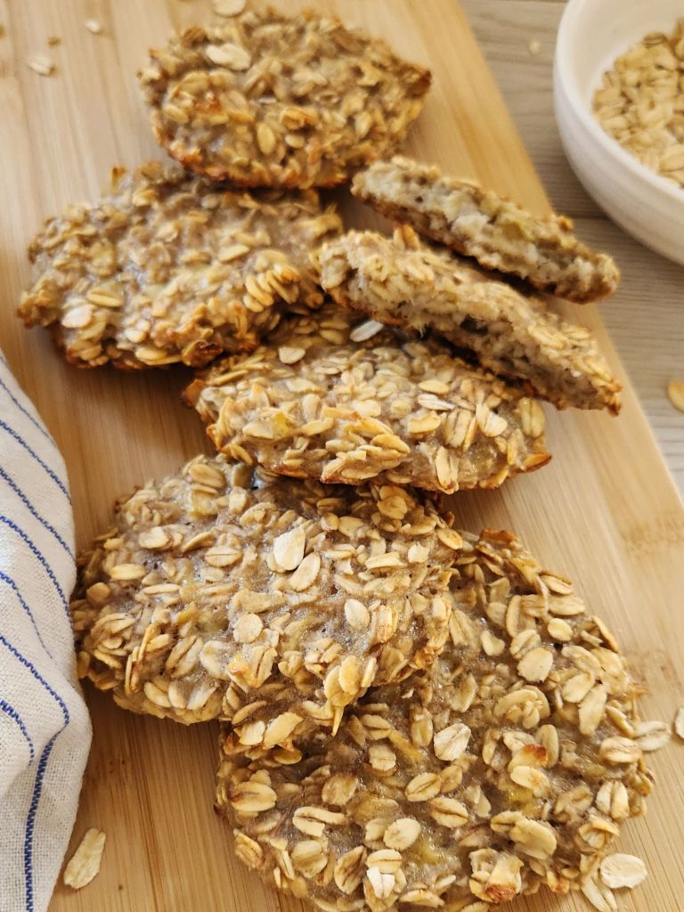 Healthy 2-ingredient banana oat cookies on a wooden board