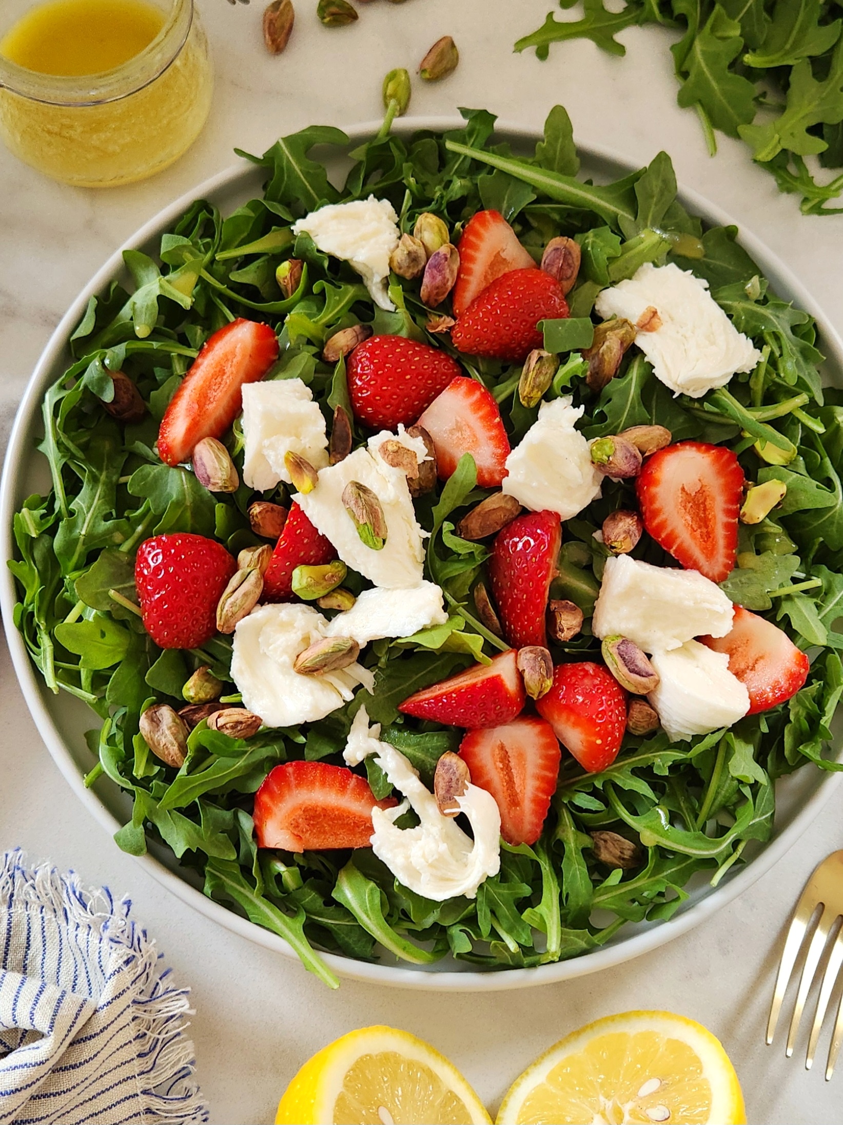 Healthy Arugula Strawberry Mozzarella Salad with Toasted Pistachos